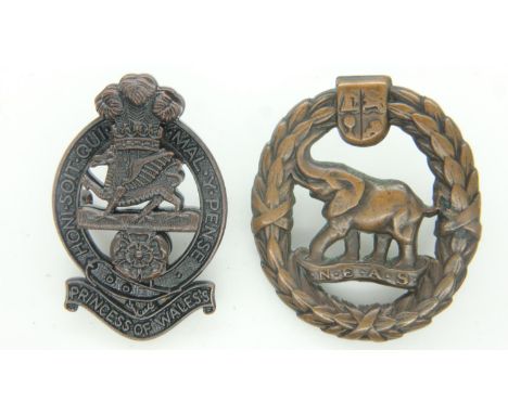 South African WWII Native Military Corps cap badge and a contemporary Princess of Wales' Own Regiment cap badge by Toye (2). 