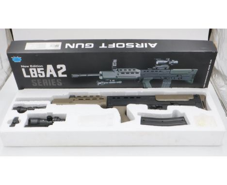 New old stock spring powered 6mm BB rifle in black/green (L85 A1 style), boxed. UK P&amp;P Group 3 (£30+VAT for the first lot