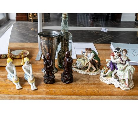 Box of Collectibles &amp; Ephemera, including two Ukranian porcelain figures of seated young ladies, two figural pieces depic