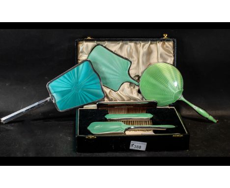 Boxed Vintage Art Deco Enamelled Guilloche Dressing Table Set, comprising a mirror, hairbrush and clothes brush, in green ena