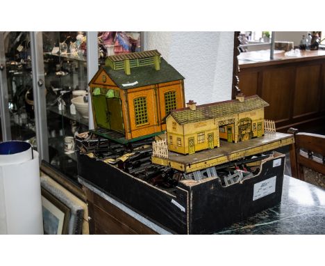 A Hornby Tin Plate Train Set to include a station, engine shed, various platforms, a quantity of track, and train.  
