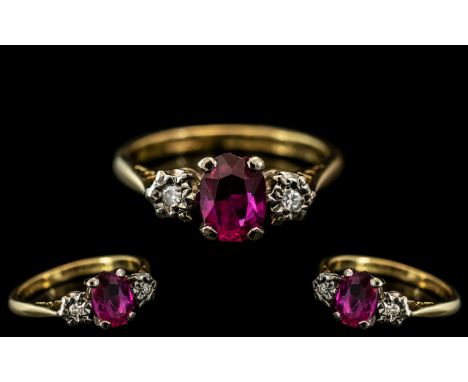 18ct Gold and Platinum Ruby and Diamond Set Ring. Marked 18ct and Platinum to Interior of Shank. The Central Ruby of Excellen