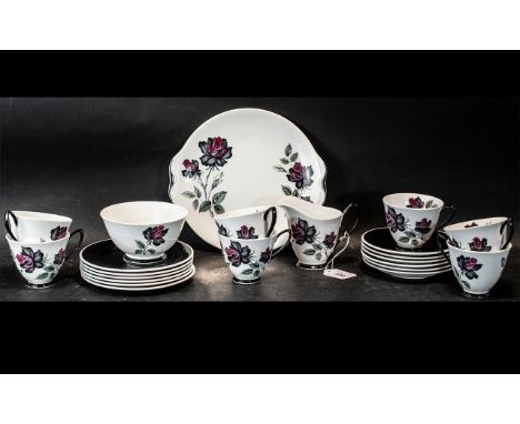 Royal Albert Bone China Tea Set 'Masquerade', comprising seven tea cups, six saucers, six side plates, milk jug and sugar bow