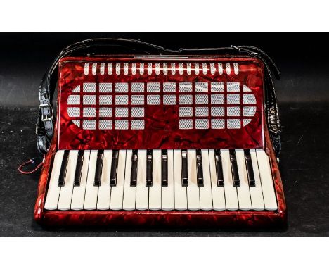 Piano Accordion by Chanson, red, in fitted carrying bag. 