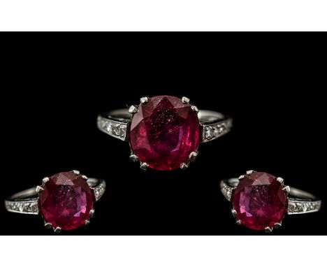 18ct White Gold - Good Quality Ruby and Diamond Set Ring, The Central Large Natural Faceted Ruby of Excellent Colour, With Di