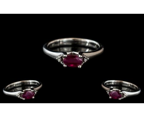 Platinum - Modernistic and Attractive Ruby and Diamond Set Dress Ring. Marked 950 pt to Interior of Shank. The Faceted Ruby o