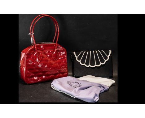 Lulu Guinness Red Patent Quilted Bag, twin handles, lined with red lip pattern fabric. Together with Lulu Guinness black and 