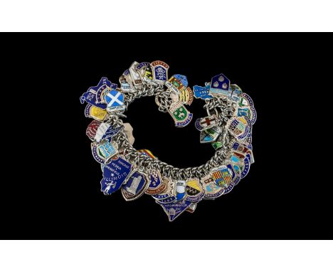 A Vintage - Sterling Silver and Enamel Crested Souvenier Charms - Bracelet, Loaded with Over 70 Charms From All Over The Worl