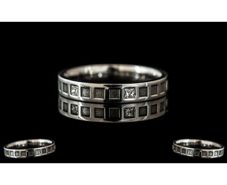 A Platinum Diamond Set Wedding/Eternity Ring,  set with six princess cut diamonds, fully hallmarked.  Ring size K/L.  Weight 