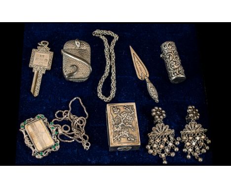 A Small Mixed Lot, comprising an embossed silver scent bottle, hallmarked for Birmingham U 1894, Chinese silver match holder,