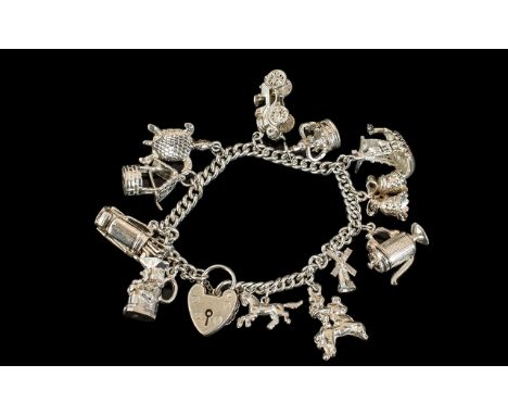 A Good Quality Vintage Sterling Silver Charm Bracelet Loaded with 13 Silver Charms of Various Subjects. Comprises Golf Bag wi