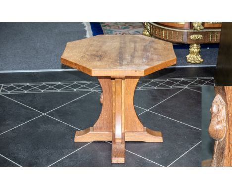 Robert Thompson, Mouseman of Kilburn, oak octagonal topped occasional table adzed top and carved mouse signature to support. 