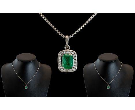 14ct White Gold - Attractive Emerald and Diamond Set Pendant, Attached to a 14ct Gold Chain of Excellent Quality. The Step-cu