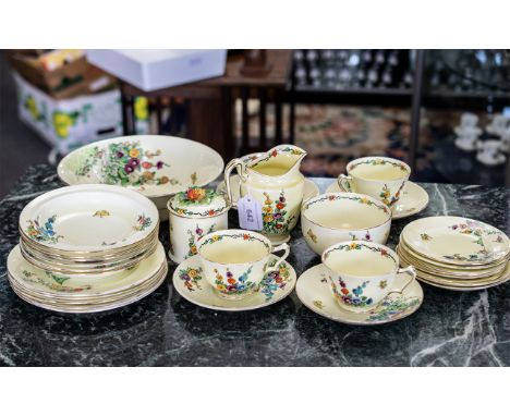 Crown Staffordshire No. 742202 'Hollyhocks' Porcelain, comprising a 9" diameter bowl, a milk jug, sugar bowl and lidded compo