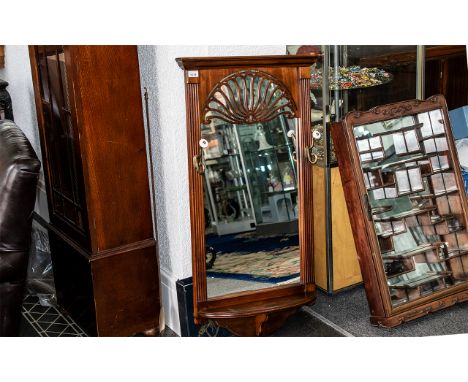 American Mahogany Hall Mirror with shelf and two coat hooks. Measures height 42'', 23'' wide.