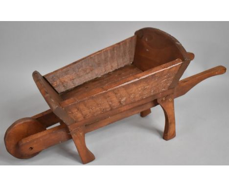 A Pine Wheelbarrow Planter, 55cms Long 