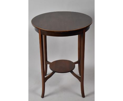 A Mahogany String Inlaid Circular Occasional Table with Stretcher Shelf, 71cms High 