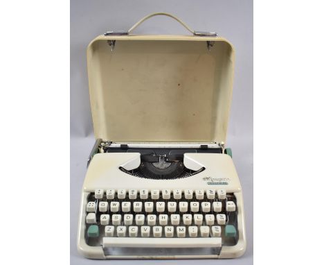 An Olympia Splendid 33 West German Typewriter in Case 