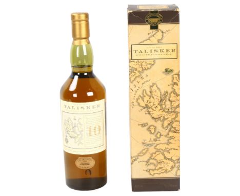 A bottle of Talisker 10 Year Old Single Malt Scotch Whisky, map box 