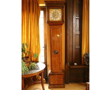 An 18th century walnut and marquetry cased 8-day longcase clock, the 12" square brass dial having silvered Roman chapter ring