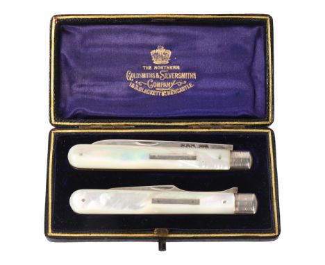 A Victorian folding fruit knife and fork set, both hallmarked Birmingham 1894, maker H&T, mother of pearl handles, in origina