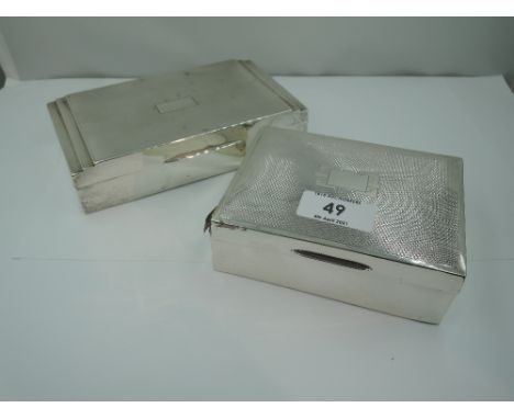 Two HM silver cigarette boxes, both having engine turned decoration and plain cartouches, both AF,  GW approx 548g