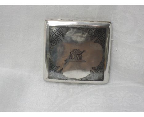 A Middle Eastern white metal cigarette case of hinged square form having niello scenic decoration and chequered border, no ma