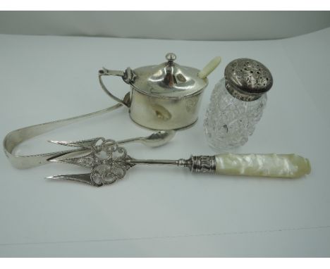 A Victorian silver pickle fork having engraved and pierced decoration and a mother of pearl handle, Sheffield 1899, Francis H