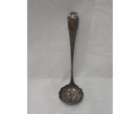 A Georgian Scottish silver sugar sifting spoon/ladle having repousse decoration to frilled bowl and engraved stem with plain 