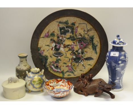 Oriental Ceramics  - a Japanese charger; a blue and white jar and cover decorated with flowering prunus; a wavy edge bowl in 