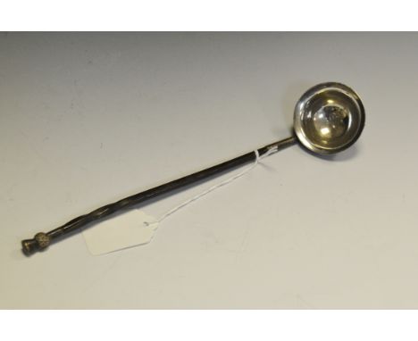 A Victorian silver toddy ladle, wrythen whale bone haft