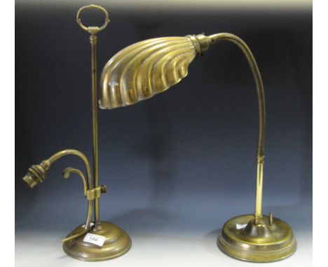An early 20th century brass angle poise lamp, shell shade, another (2).