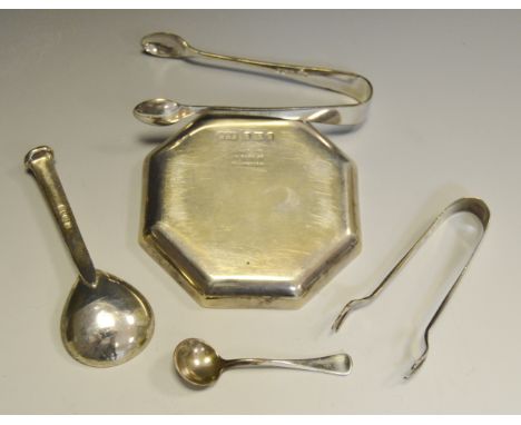 Silver - a silver octagonal pin dish London 1937,  101.8g; a silver caddy spoon 30g; sugar tongs 7.1g; another pair 9.2g 