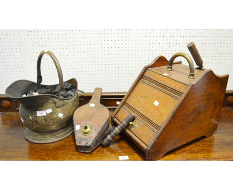 A Victorian helmet shaped coal scuttle; another oak purdonium, elm bellows (3) 