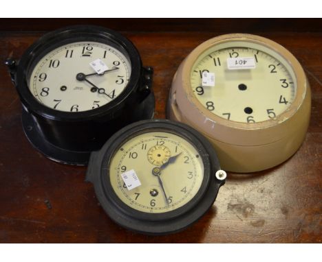 A Chelsea Ships Bell chronometer; a Russian wall  clock; another (3)