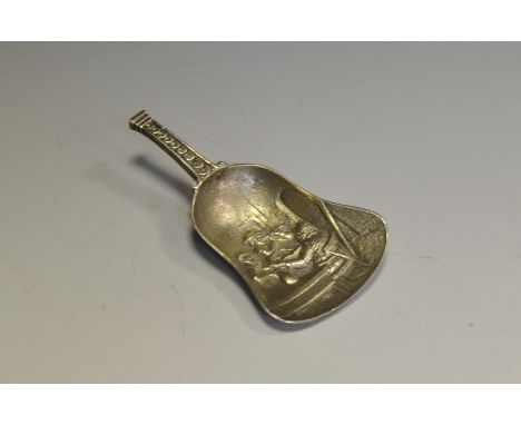 An early 20th century Dutch silver caddy spoon