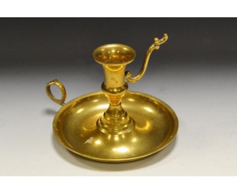 An Indian brass chamber stick