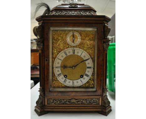 A Georgian design burr walnut cased bracket clock,
with 8-day movement and ormolu mounts, height 16".