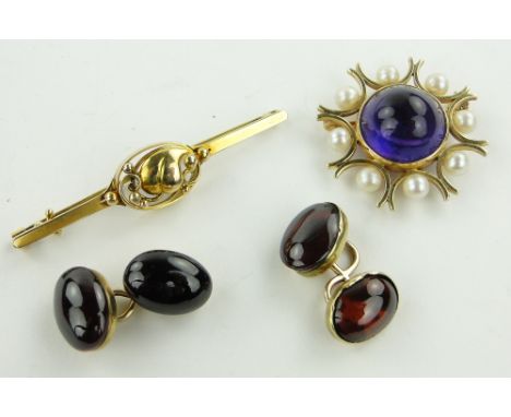Pair of unmarked gold garnet set cufflinks,
a gold amethyst and pearl brooch and another gold bar brooch.