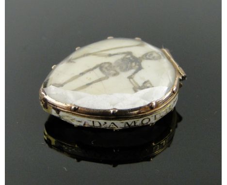 An unusual Antique unmarked gold memento mori locket pendant,
with inset painting of a skeleton and hair panel on the reverse