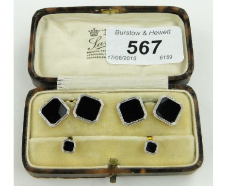 Pair of Art Deco 18ct gold platinum and onyx cufflinks,
and a pair of matching dress studs, cufflinks 12mm across.