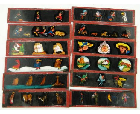 A set of 12 early painted glass magic lantern slides, 
length 8", boxed.