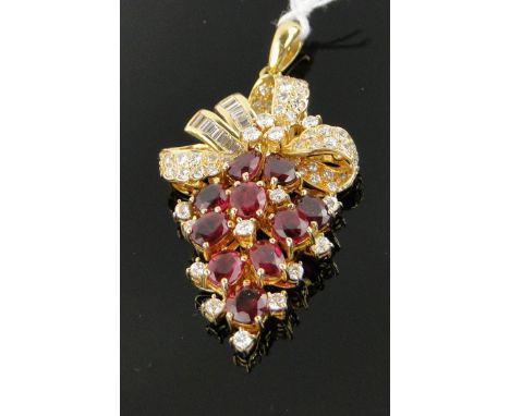A fine quality modern 18ct gold ruby and diamond pendant,
in the form of a bunch of grapes, marked 750, indistinct makers mar