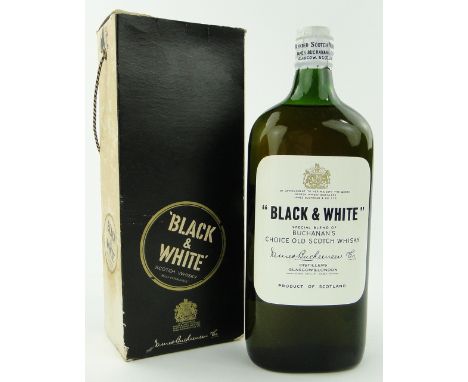 Boxed bottle of "Black & White" Scotch Whisky,
"Under British Government Supervision."