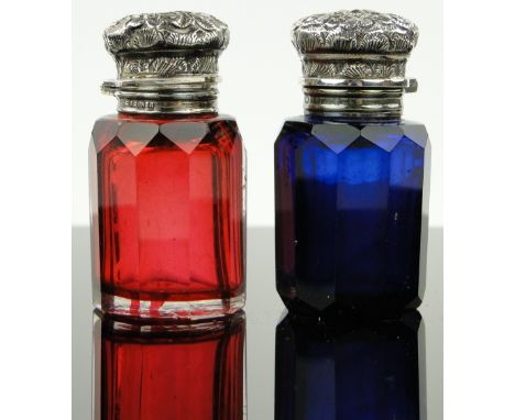 2 similar Victorian Bristol Blue & Ruby glass smelling salt jars,
with floral embossed hinged silver tops, 1897 and 1900, hei
