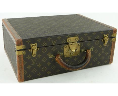 A Vintage Louis Vuitton suitcase 
circa 1970s, with fitted interior, length 17.5".