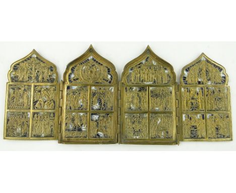 A 19th century Russian brass and enamel quadratych icon
found in the remains of the Imperial Family possessions by the childr