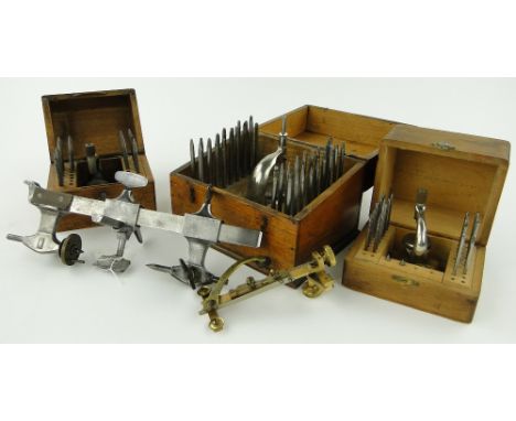 A watchmaker's lathe,
and 3 cased watchmaker's staking tool kits, one by Boley & Leinen, Esslingen.