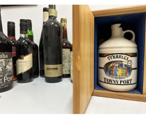 Twelve mixed bottles to include 1973 Vintage port, Tyrrells Tawny port A/F, and othersLocation: 