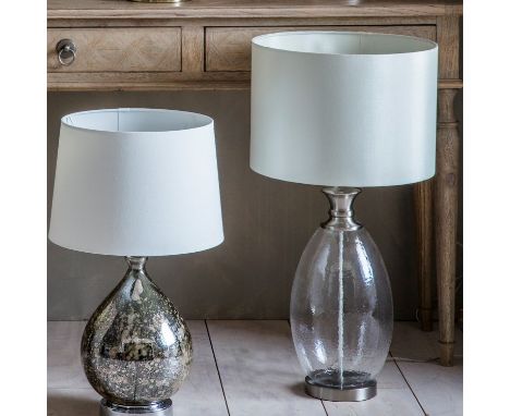 { Option of lots:  103, 103a } Sulgrave Table Lamp With a clear glass base and a white cylindrical shade, the Sulgrave table 